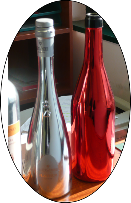 chrome wine bottle and chrome bottle with red top coat