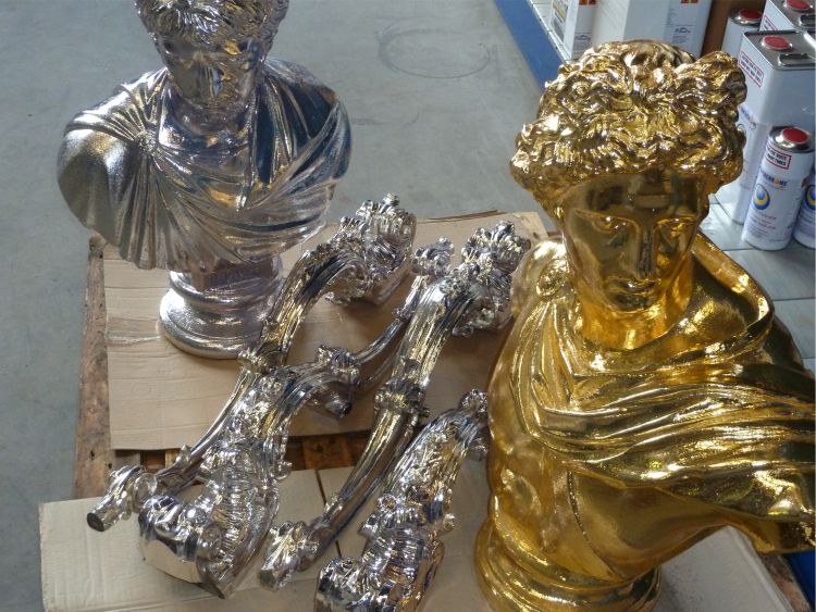 chrome and gold painted statues